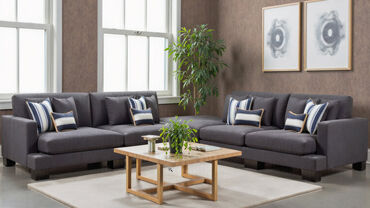 Manhattan 4 seater fabric modular sofa with ottoman in a mod